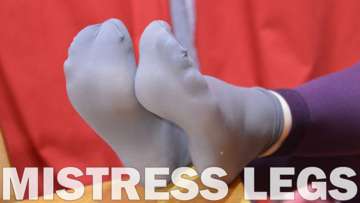 Soles and toes in grey nylon socks