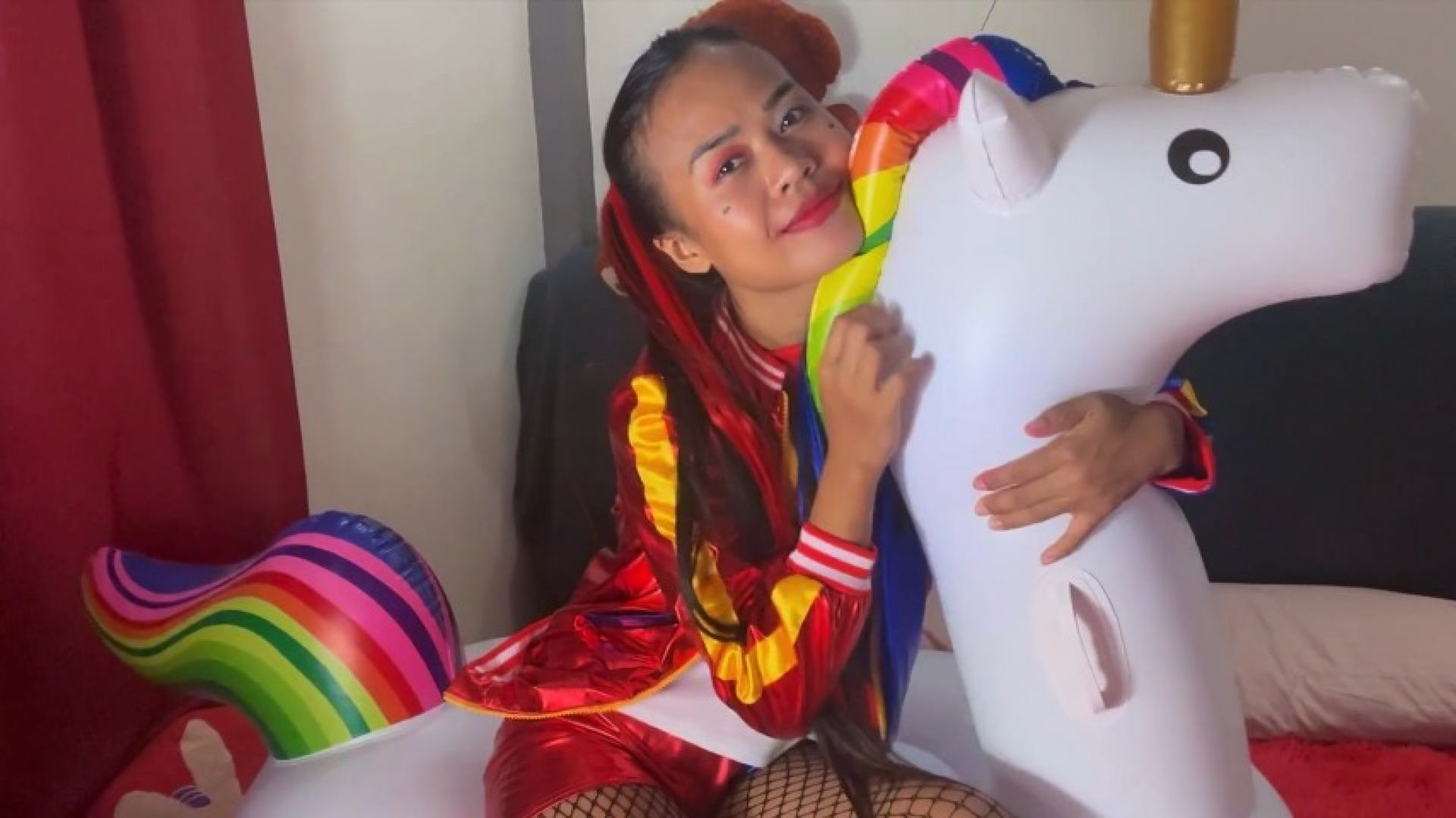asianloonergirls:Camylle Rides & Pops Your Inflatable Unicorn As Harley Quinn