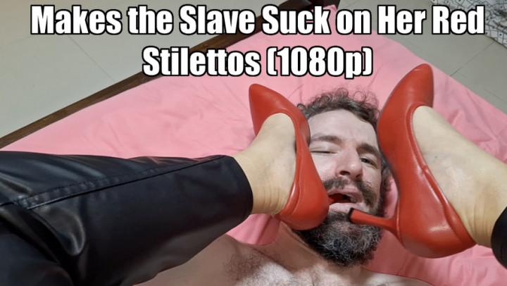Under Nanas Boots:Makes the Slave Suck on Her Red Stilettos While She Facesits