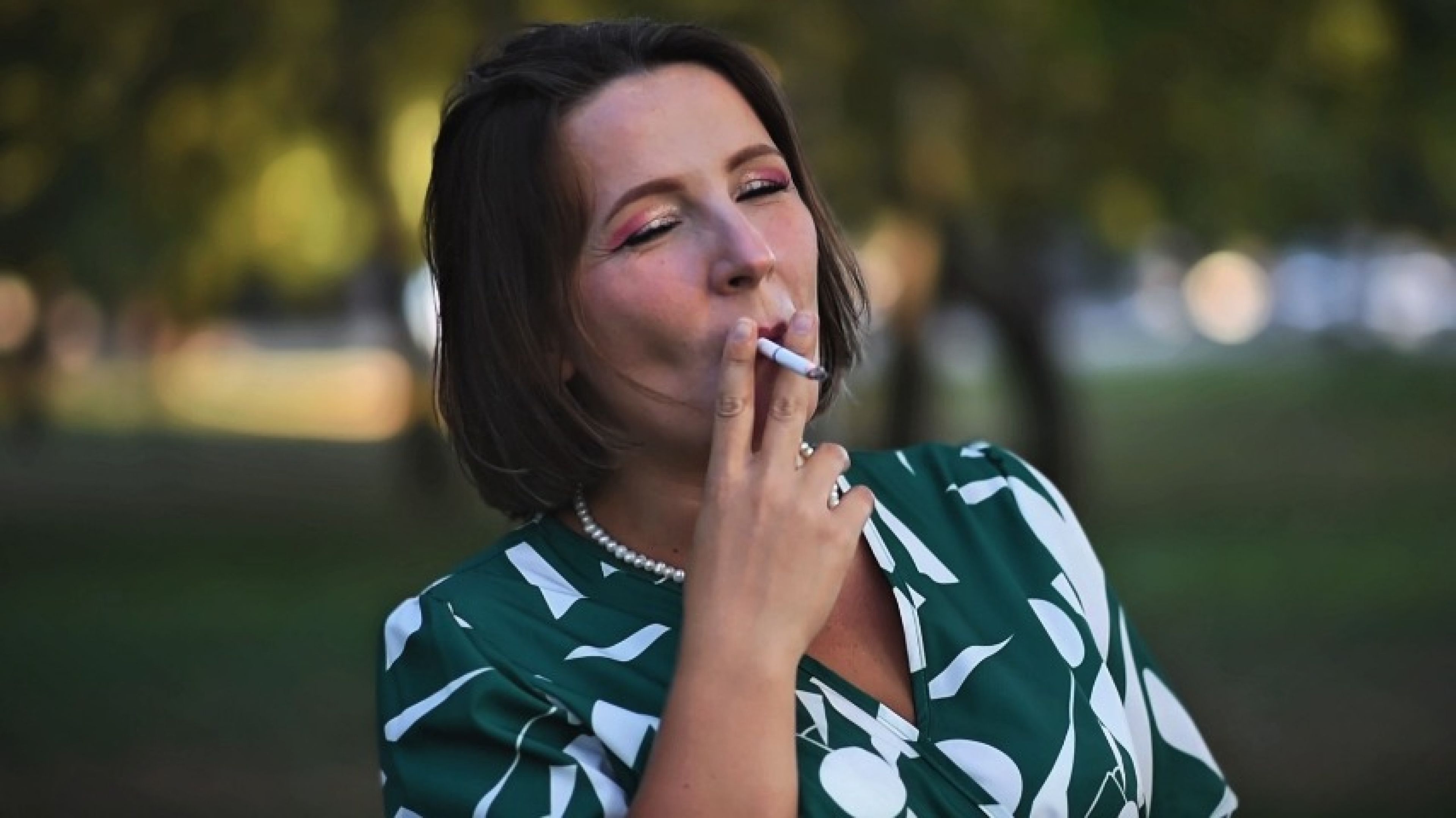maryqueen:I take a drag on my cigarette, blowing smoke in your direct